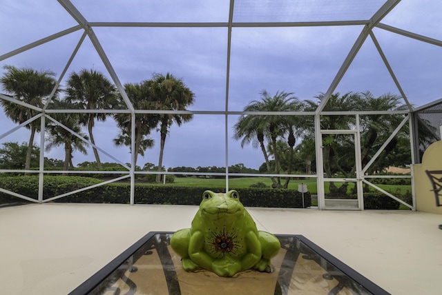 view of patio with a lanai