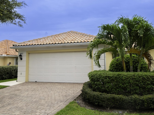 view of front of home featuring a garage