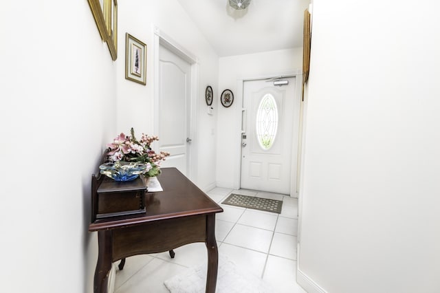 entrance foyer with light tile patterned floors