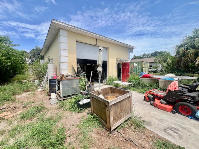 exterior space featuring a garage