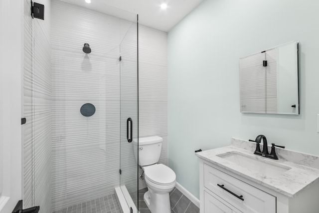 bathroom with tile patterned flooring, vanity, toilet, and an enclosed shower