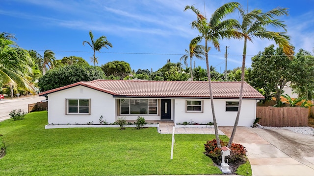 view of front of home with a front lawn