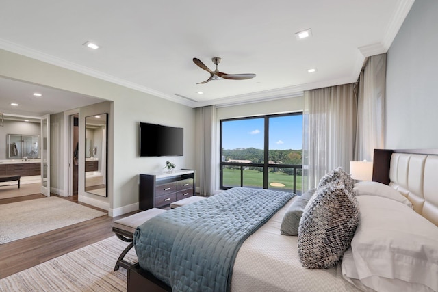 bedroom with ensuite bath, crown molding, light wood-type flooring, and ceiling fan