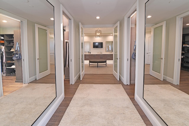 corridor featuring hardwood / wood-style flooring