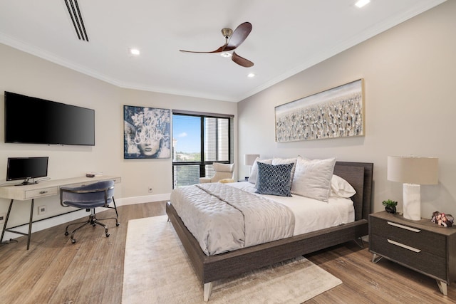 bedroom with ornamental molding, light wood-type flooring, and ceiling fan