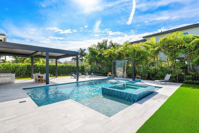 view of swimming pool with a patio area, an in ground hot tub, and area for grilling