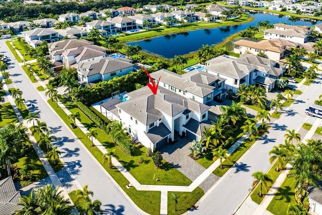 drone / aerial view featuring a water view