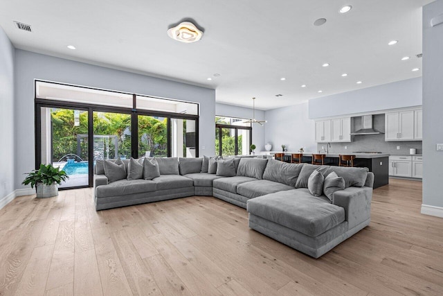 living room with light hardwood / wood-style floors