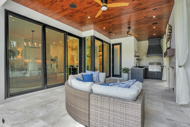 view of patio with ceiling fan, sink, area for grilling, and an outdoor living space