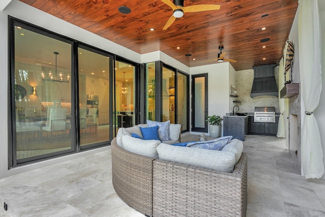 view of patio / terrace featuring a sink, outdoor lounge area, a ceiling fan, and area for grilling