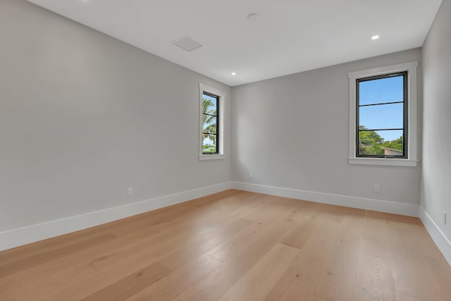 empty room with light wood-type flooring