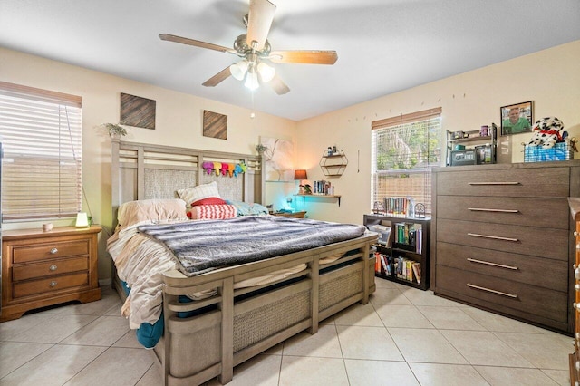 tiled bedroom with ceiling fan