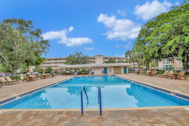 view of pool featuring a patio