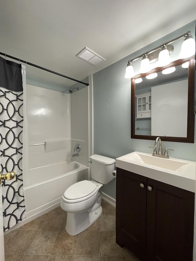 full bathroom with vanity, tile patterned flooring, toilet, and shower / bath combo with shower curtain