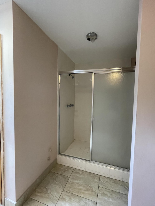 bathroom featuring walk in shower