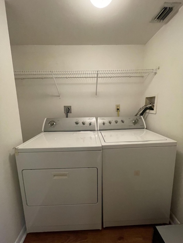 washroom featuring separate washer and dryer