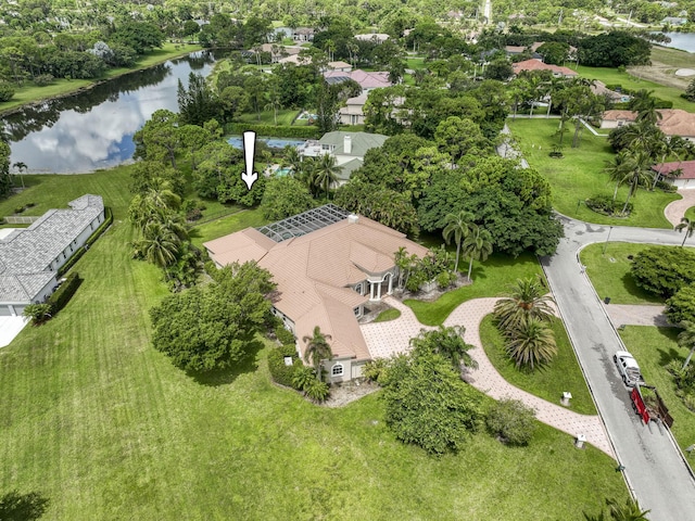 bird's eye view with a water view