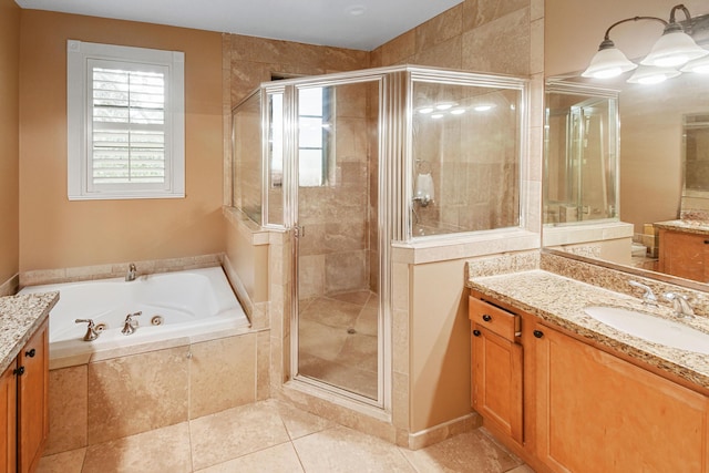 bathroom featuring vanity, tile patterned flooring, and plus walk in shower