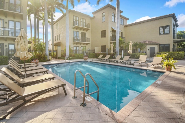 view of pool featuring a patio