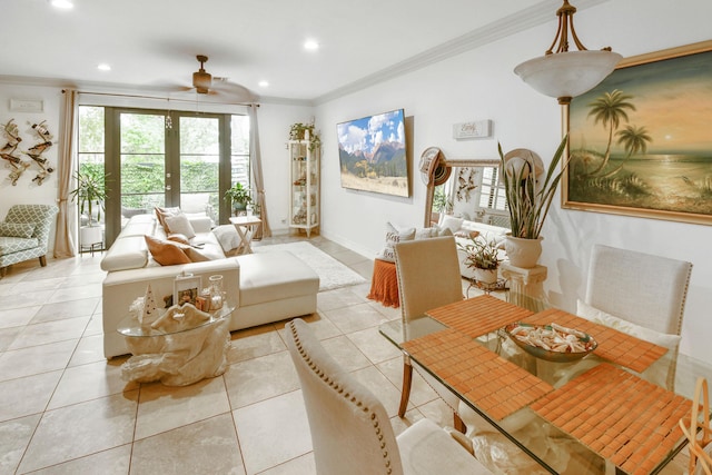 living room featuring light tile patterned floors, ornamental molding, french doors, and ceiling fan