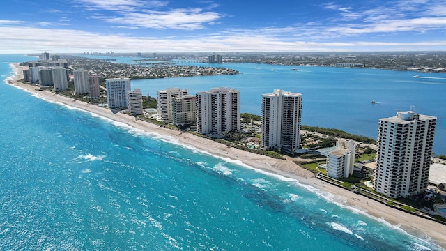 bird's eye view featuring a water view and a view of the beach