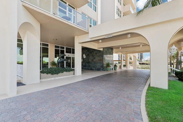 property entrance with a balcony