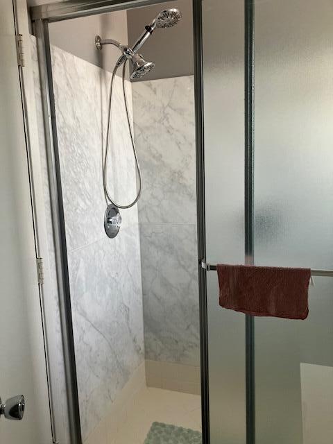 bathroom with an enclosed shower