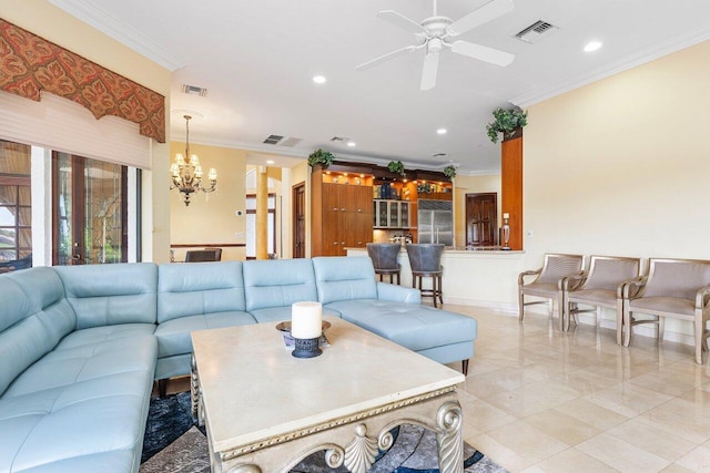 living room featuring ornamental molding and ceiling fan with notable chandelier