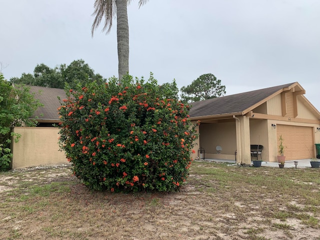 exterior space featuring a garage