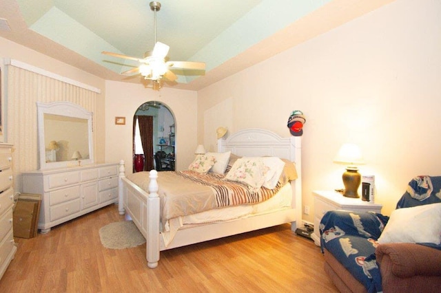 bedroom featuring light hardwood / wood-style flooring and ceiling fan