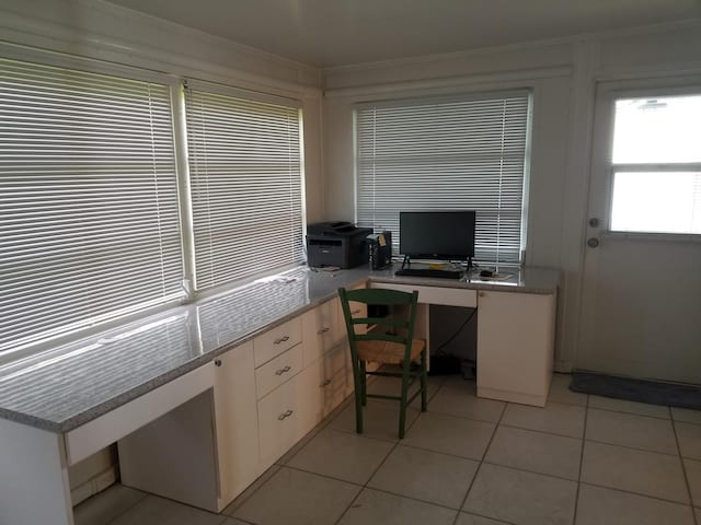 tiled office featuring built in desk