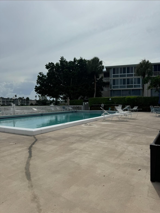 view of pool featuring a patio