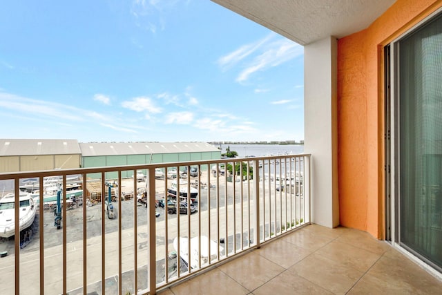 balcony featuring a water view