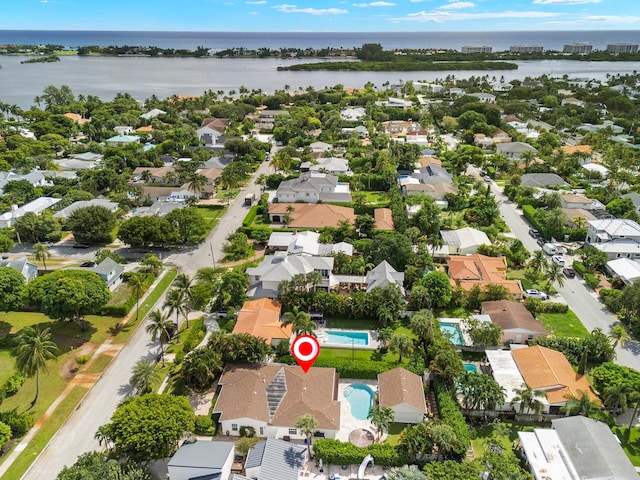 drone / aerial view with a water view