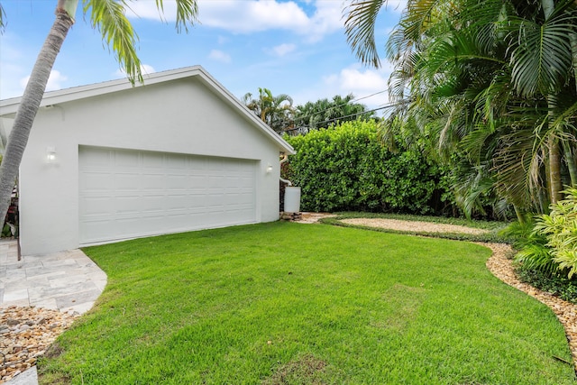 view of yard with a garage