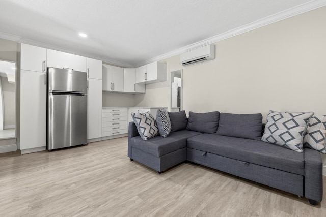 living room with light hardwood / wood-style flooring, ornamental molding, and a wall unit AC