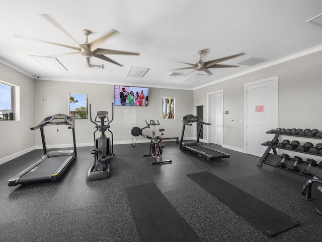 exercise room featuring ornamental molding