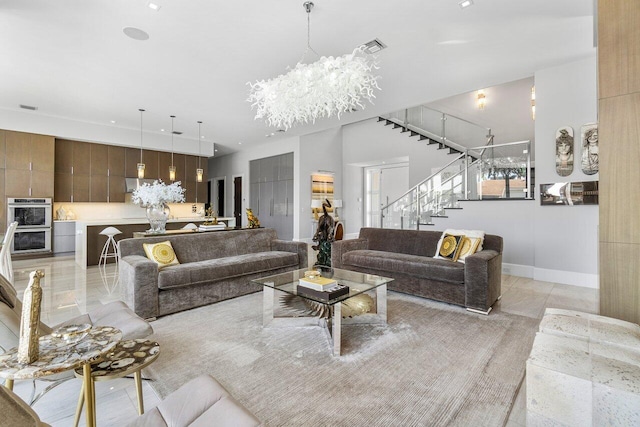 living room featuring an inviting chandelier