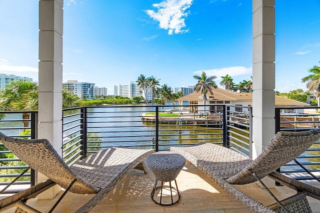 balcony featuring a water view