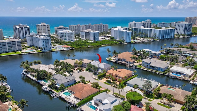 birds eye view of property featuring a water view