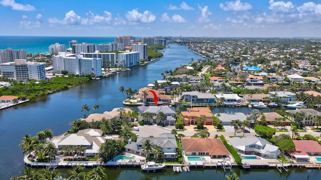 drone / aerial view featuring a water view