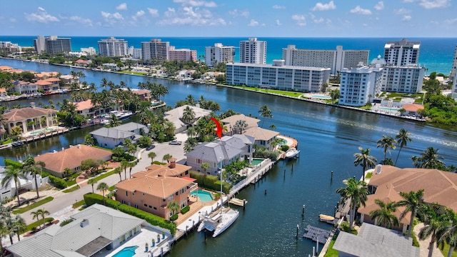 bird's eye view with a water view