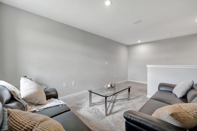 living area with light colored carpet, recessed lighting, baseboards, and visible vents