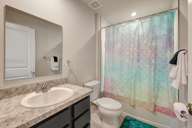 full bathroom featuring shower / bathtub combination with curtain, toilet, vanity, and visible vents