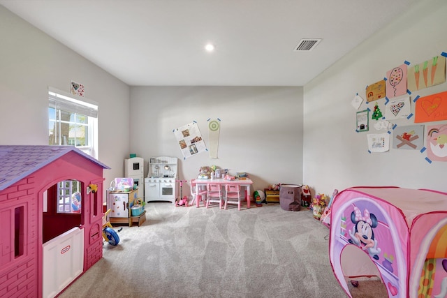 game room with visible vents and carpet floors