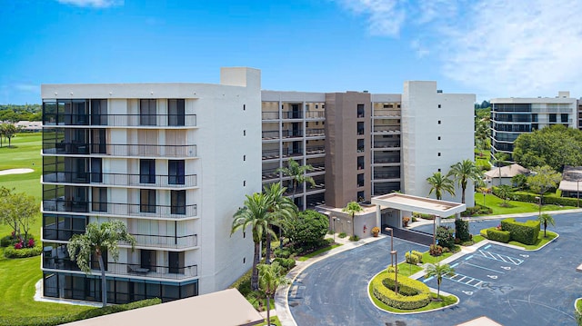 5279 Fountains Dr S Unit 602, Lake Worth, FL 33467 - view of building exterior featuring uncovered parking