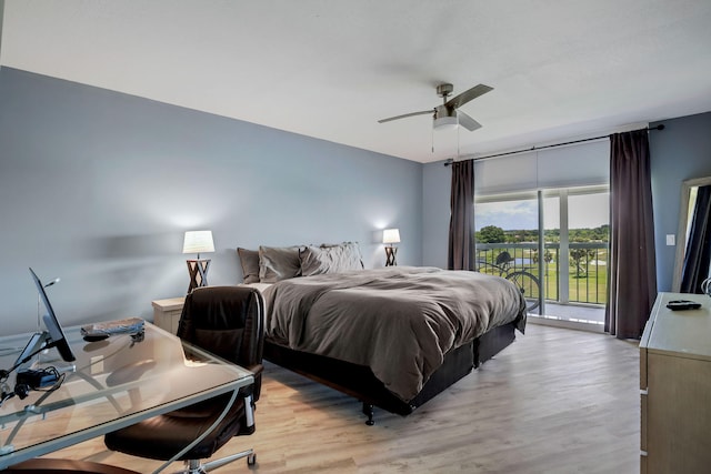 5279 Fountains Dr S Unit 602, Lake Worth, FL 33467 - bedroom with access to outside, light wood-style floors, and ceiling fan
