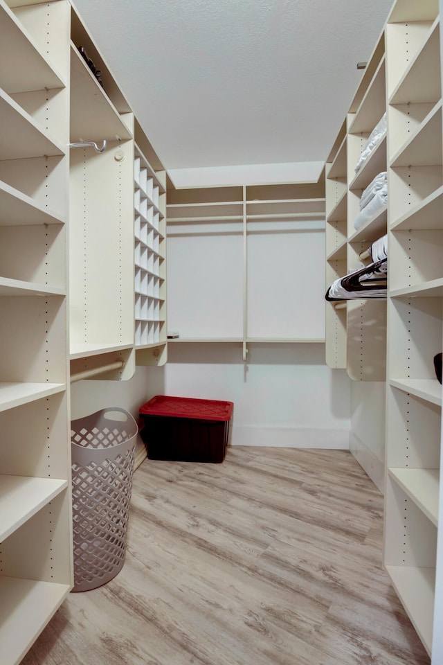 5279 Fountains Dr S Unit 602, Lake Worth, FL 33467 - walk in closet with wood finished floors