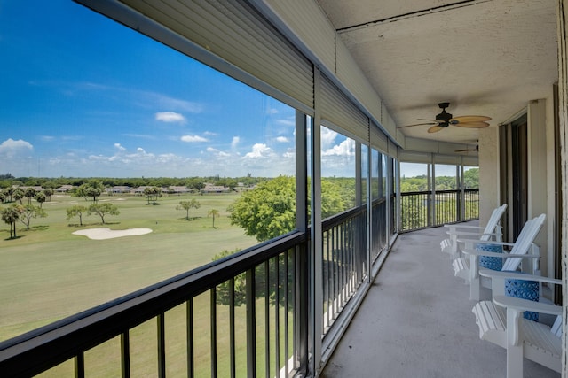 5279 Fountains Dr S Unit 602, Lake Worth, FL 33467 - balcony with a ceiling fan and golf course view