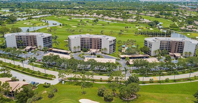 5279 Fountains Dr S Unit 602, Lake Worth, FL 33467 - drone / aerial view with a water view and golf course view